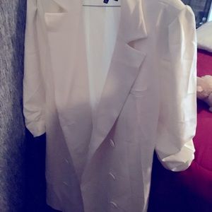 Knee length trench suit coat.